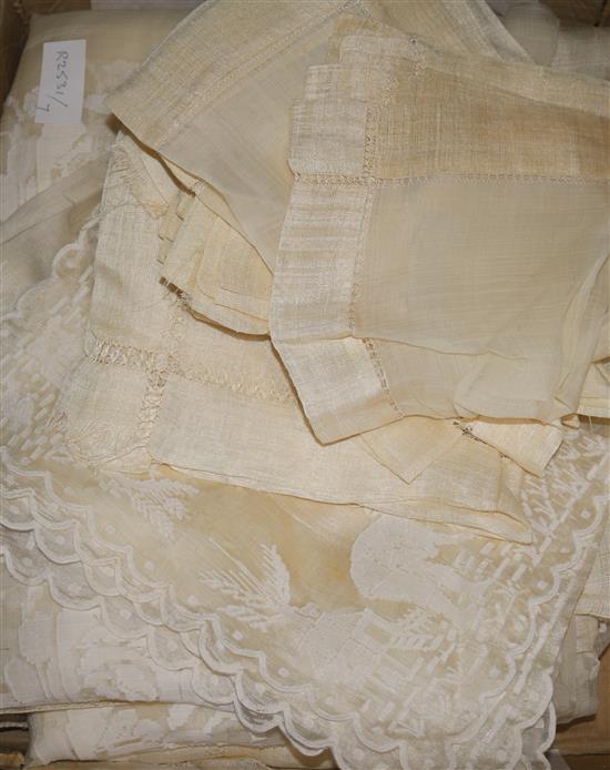 A cream silk gauze table cloth and napkins